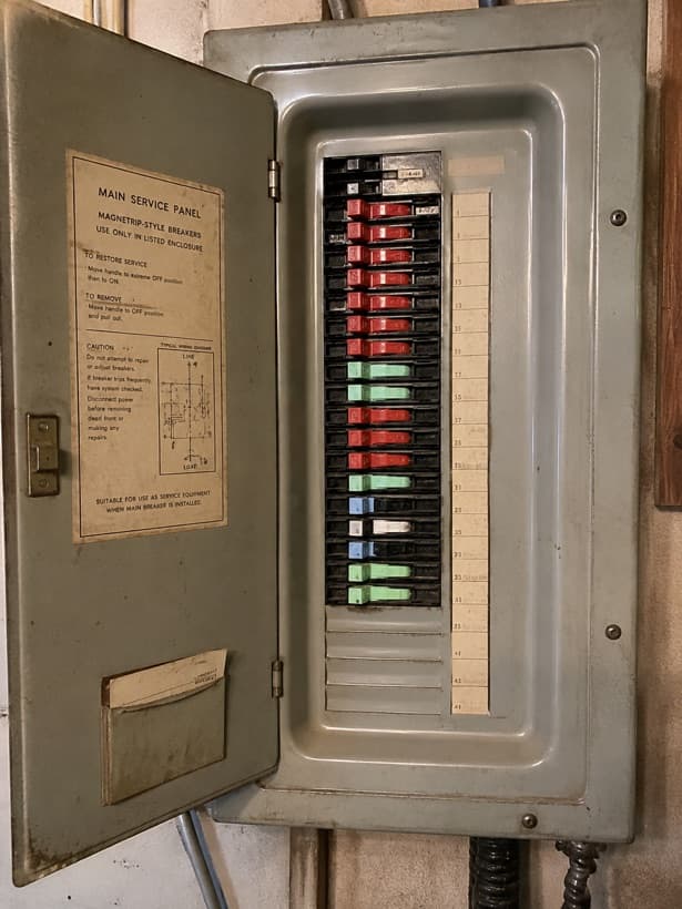 Zinsco electrical panel with colored breaker handles